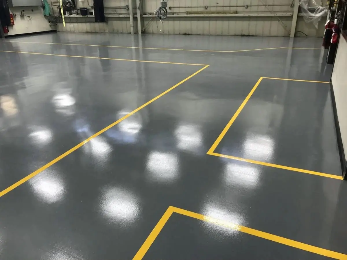 Industrial epoxy floor with yellow bay markings