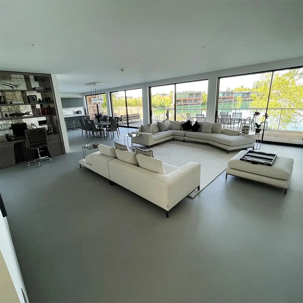 Seamless poured resin floor in an open living space