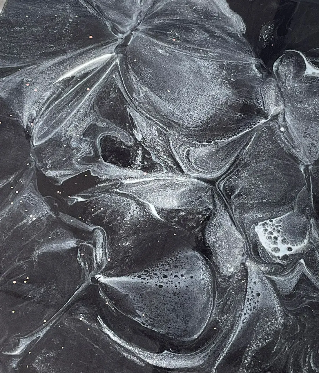 Black and silver marbled metallic epoxy resin floor